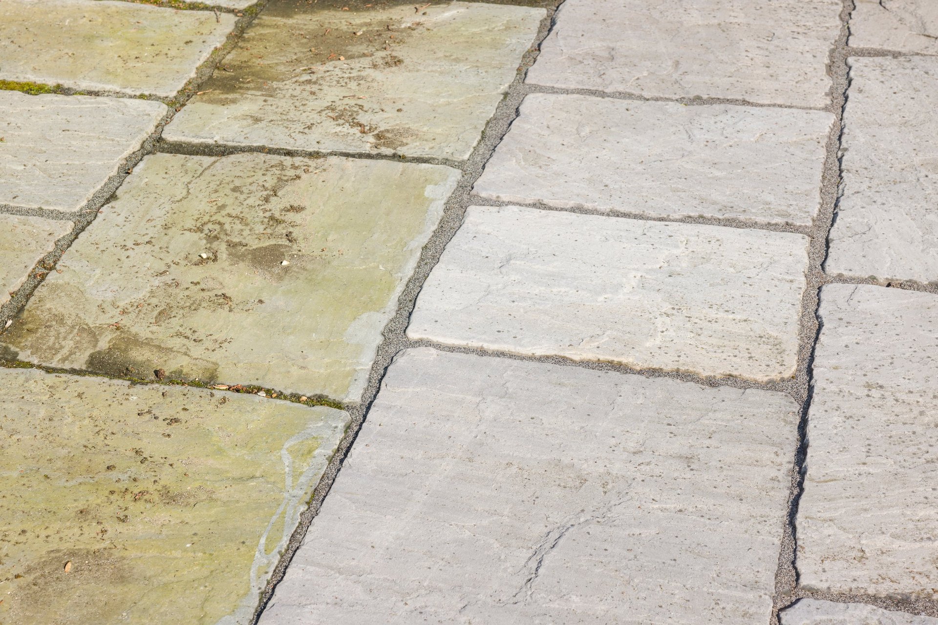 Pressure washing a patio for property maintenance in Sevierville, TN